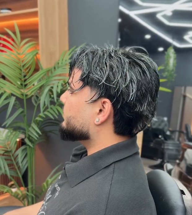 Messy fringe with a taper and beard shape-up