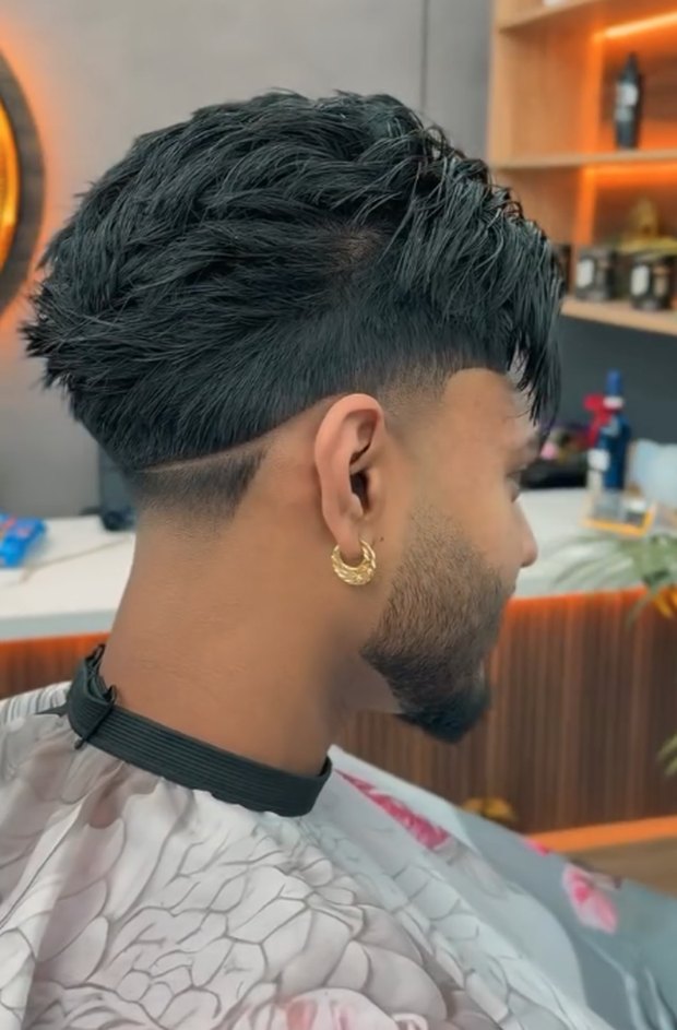 Low taper fade with a textured top
